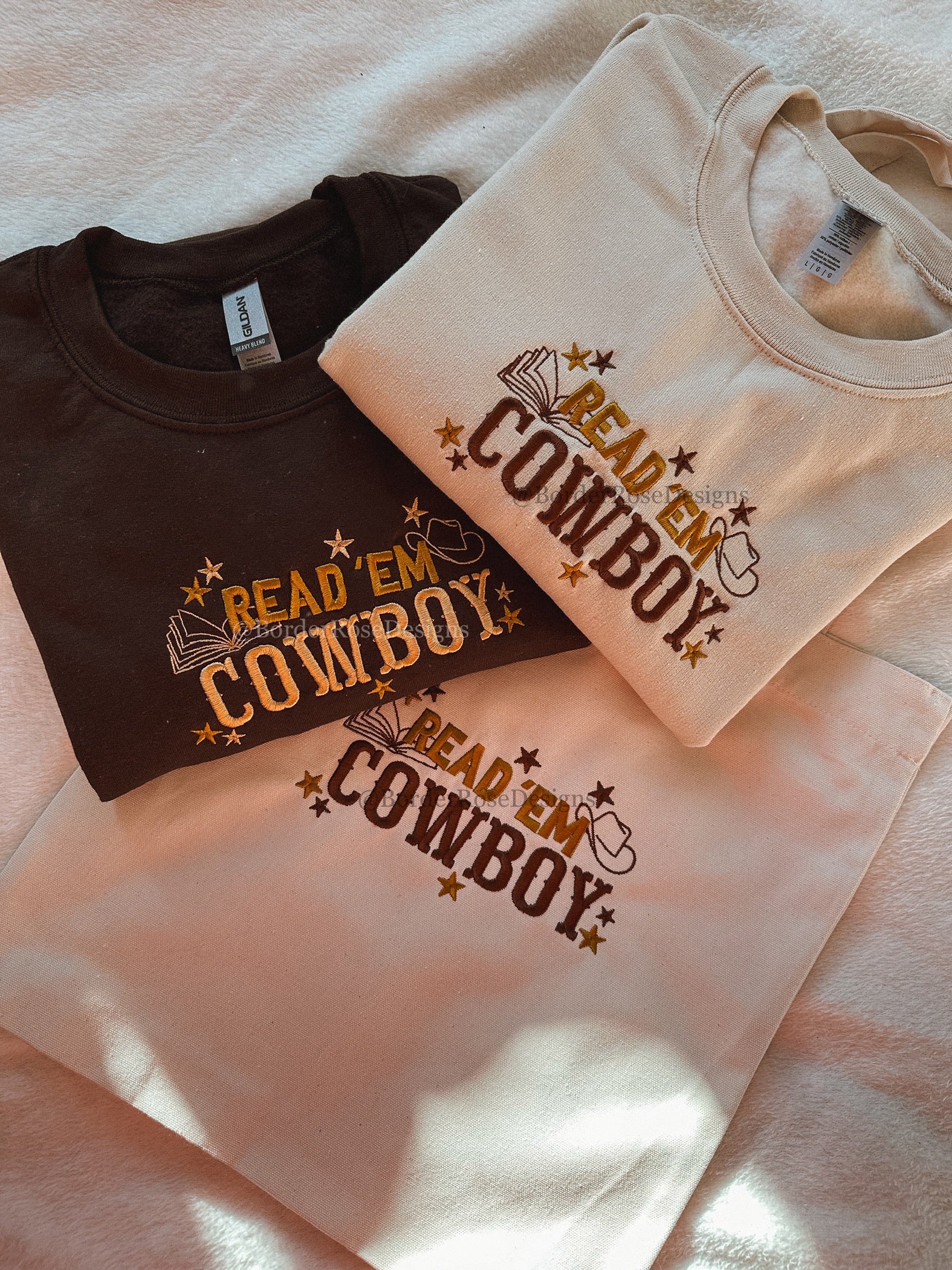 Read 'Em Cowboy Unisex Embroidered Sweatshirt