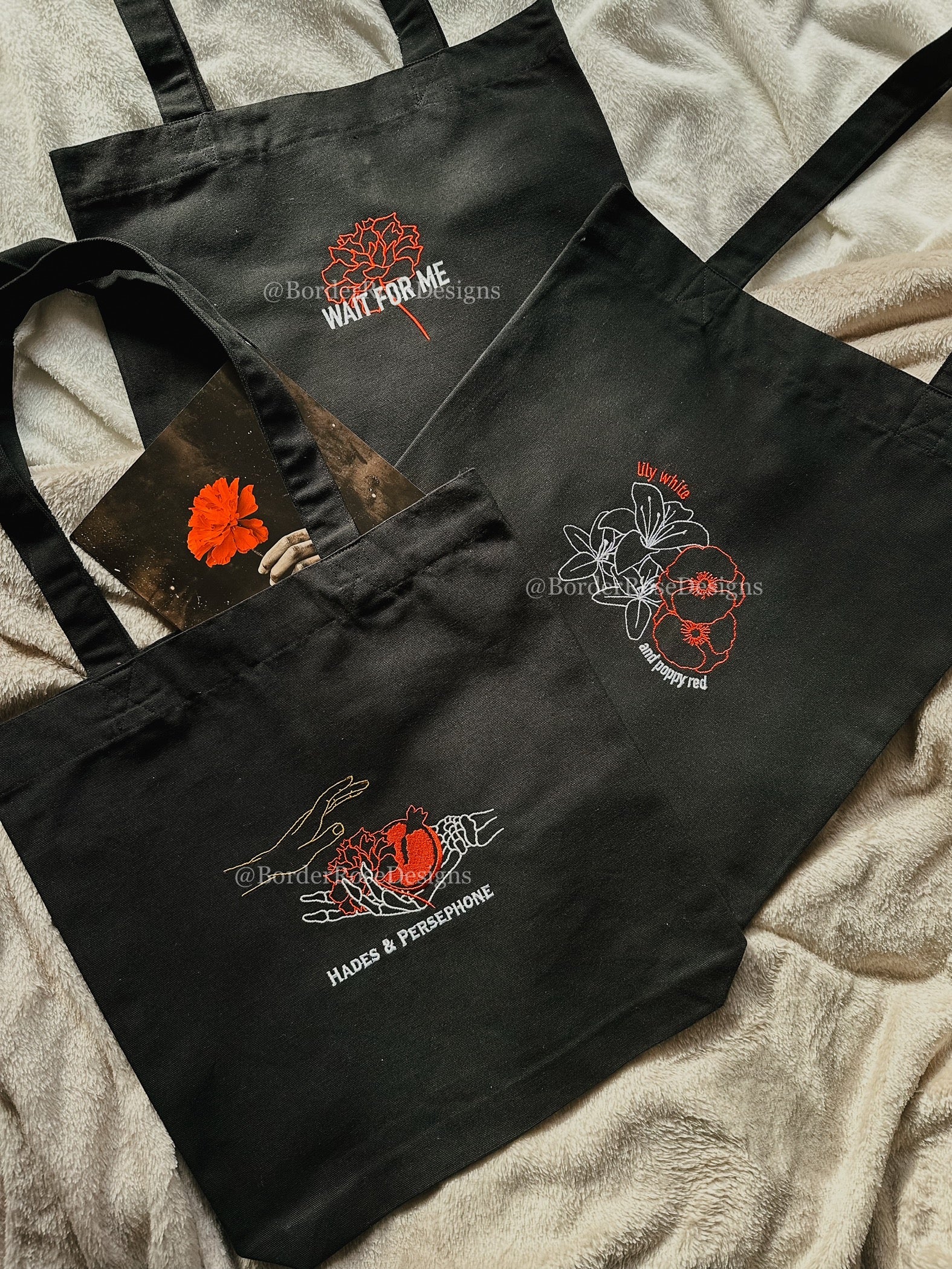 Lily White and Poppy Red Flowers Hadestown Embroidered Tote Bag